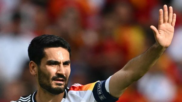 Germany's midfielder #21 Ilkay Gundogan gestures during the UEFA Euro 2024 quarter-final football match between Spain and Germany at the Stuttgart Arena in Stuttgart on July 5, 2024. (Photo by Fabrice COFFRINI / AFP)