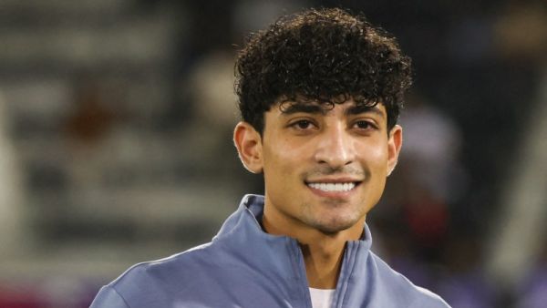 Iraq's forward #07 Ali Jasim poses with the AFC Qatar 2024 Asian Cup top goal scorer trophy after the U23 AFC Qatar 2024 Asian Cup final match between Japan and Uzbekistan at Jassim Bin Hamad Stadium in Doha on May 3, 2024. (Photo by KARIM JAAFAR / AFP)