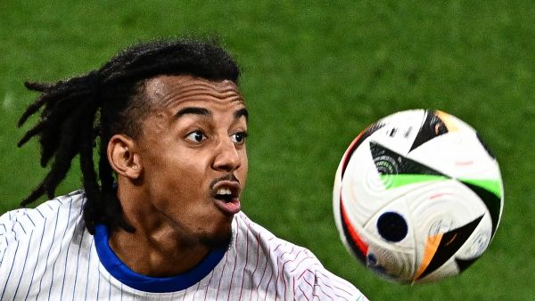 France's defender #05 Jules Kounde looks at the ball during the UEFA Euro 2024 Group D football match between the Netherlands and France at the Leipzig Stadium in Leipzig on June 21, 2024. (Photo by GABRIEL BOUYS / AFP)
