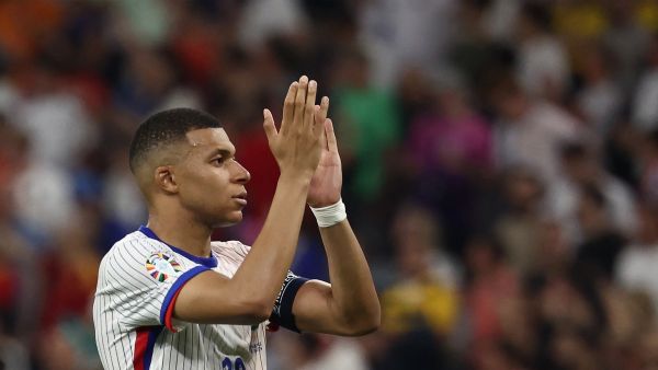 France's forward #10 Kylian Mbappe applauds supporters after losing the UEFA Euro 2024 semi-final football match between Spain and France at the Munich Football Arena in Munich on July 9, 2024. (Photo by FRANCK FIFE / AFP)