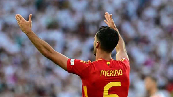 Spain's midfielder #06 Mikel Merino celebrates scoring his team's second goal during the UEFA Euro 2024 quarter-final football match between Spain and Germany at the Stuttgart Arena in Stuttgart on July 5, 2024. (Photo by Tobias SCHWARZ / AFP)