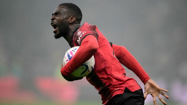 AC Milan's English defender #23 Fikayo Tomori celebrates scoring his team's first goal during the Italian Serie A football match between AC Milan and Inter Milan at the San Siro Stadium in Milan on April 22, 2024. (Photo by Marco BERTORELLO / AFP)