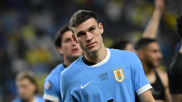 Uruguay's midfielder #05 Manuel Ugarte celebrates after scoring in a penalty shoot-out to win the Conmebol 2024 Copa America tournament quarter-final football match between Uruguay and Brazil at Allegiant Stadium in Las Vegas, Nevada on July 6, 2024. (Photo by Robyn BECK / AFP)