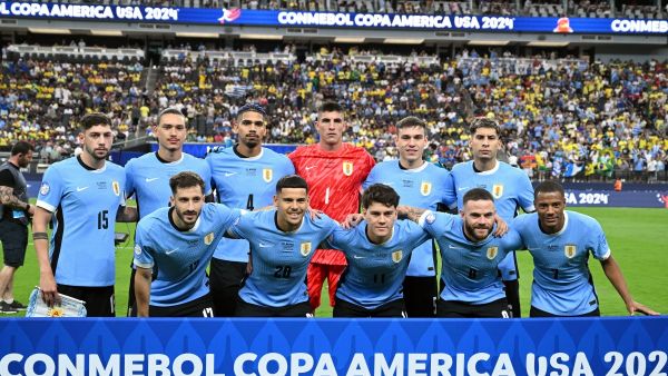 Uruguay's players pose for pictures ahead of the Conmebol 2024 Copa America tournament quarter-final football match between Uruguay and Brazil at Allegiant Stadium in Las Vegas, Nevada on July 6, 2024. (Photo by Robyn Beck / AFP)