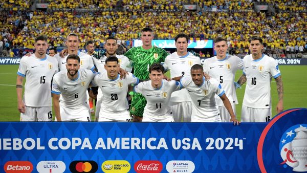 Uruguay's players pose for pictures ahead of the Conmebol 2024 Copa America tournament semi-final football match between Uruguay and Colombia at Bank of America Stadium, in Charlotte, North Caroline on July 10, 2024. (Photo by JUAN MABROMATA / AFP)