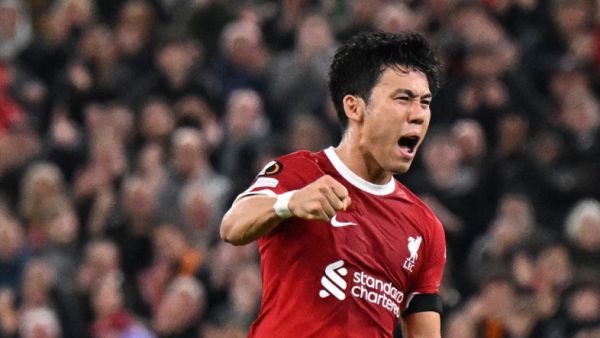 Liverpool's Japanese midfielder #03 Wataru Endo celebrates scoring the team's second goal during the UEFA Europa League group E football match between Liverpool and Toulouse at Anfield in Liverpool, north west England on October 26, 2023. (Photo by Oli SCARFF / AFP)