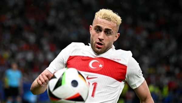 Turkey's forward #21 Baris Alper Yilmaz runs for the ball during the UEFA Euro 2024 quarter-final football match between the Netherlands and Turkey at the Olympiastadion in Berlin on July 6, 2024. (Photo by JAVIER SORIANO / AFP)