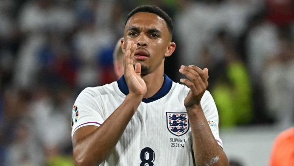 England's defender #08 Trent Alexander-Arnold applauds fans on the pitch after the UEFA Euro 2024 Group C football match between England and Slovenia at the Cologne Stadium in Cologne on June 25, 2024. (Photo by JAVIER SORIANO / AFP)