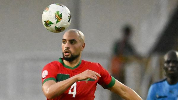 Morocco's midfielder #4 Sofyan Amrabat heads the ball during the Africa Cup of Nations (CAN) 2024 group F football match between Morocco and Tanzania at Stade Laurent Pokou in San Pedro on January 17, 2024. (Photo by SIA KAMBOU / AFP)