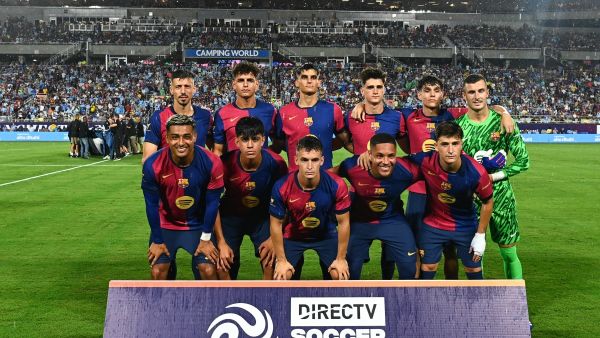 FC Barcelona poses for a team photo before the start of a 2024 FC Series pre-season friendly football match between FC Barcelona and Manchester City at Camping World Stadium in Orlando, Florida, on July 30, 2024. (Photo by CHANDAN KHANNA / AFP)