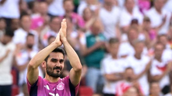 Germany's midfielder #21 Ilkay Gundogan reacts as he is substituted during the UEFA Euro 2024 Group A football match between Germany and Hungary at the Stuttgart Arena in Stuttgart on June 19, 2024. (Photo by DAMIEN MEYER / AFP)