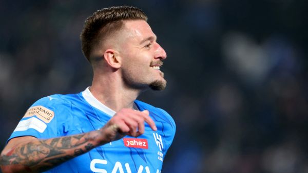 Hilal's Serbian midfielder #22 Sergej Milinkovic-Savic celebrates his goal during the Riyadh Season Cup final match between Al-Nassr and Al-Hilal at the Kingdom Arena in Riyadh, on February 8, 2024. (Photo by Fayez Nureldine / AFP)
