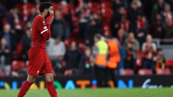 Liverpool's English defender #02 Joe Gomez reacts after the UEFA Europa League quarter-final first leg football match between Liverpool and Atalanta at Anfield in Liverpool, north west England on April 11, 2024. Atalanta won the match 3-0. (Photo by Darren Staples / AFP)