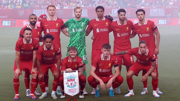 Liverpool's players pose for pictures ahead of the pre-season club friendly football match between Arsenal FC and Liverpool FC at Lincoln Financial Field in Philadelphia, Pennsylvania, on July 31, 2024. (Photo by Charly TRIBALLEAU / AFP)