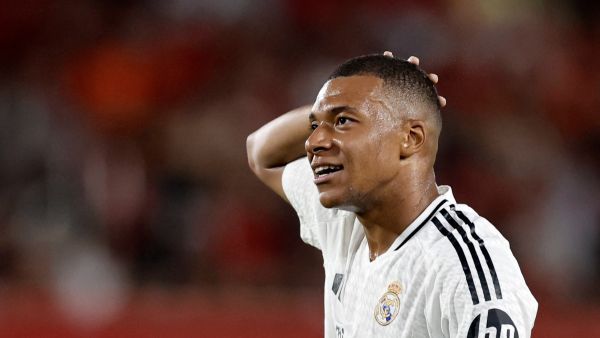 Real Madrid's French forward #09 Kylian Mbappe reacts during the Spanish league football match between RCD Mallorca and Real Madrid CF at the Mallorca Son Moix stadium in Palma de Mallorca on August 18, 2024. (Photo by OSCAR DEL POZO / AFP)