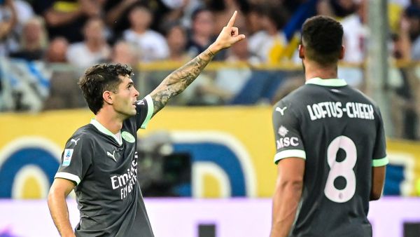 AC Milan's American forward #11 Christian Pulisic celebrates after scoring his team's first goal during the Italian Serie A football match between Parma Calcio 1913 and AC Milan at Ennio-Tardini Stadium in Parma, on August 24, 2024. (Photo by Piero CRUCIATTI / AFP)