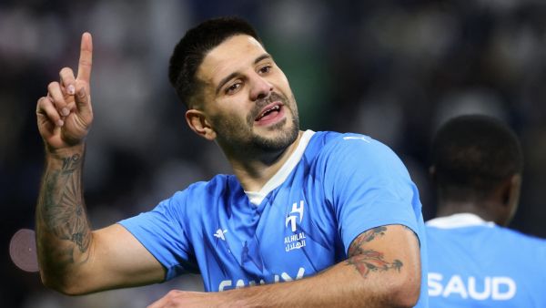 Hilal's Serbian forward #09 Aleksandar Mitrovic celebrates after scoring his team's third goal during the AFC Champions League football match between Saudi Arabia's Al-Hilal SFC and Iran’s Sepahan FC at the Kingdom Arena Stadium in Riyadh on February 22, 2024. (Photo by Fayez NURELDINE / AFP)