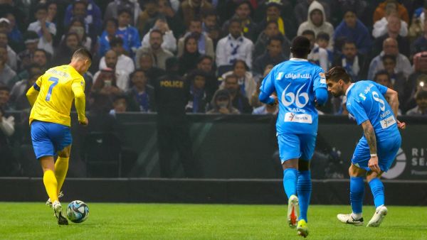 Nassr's Portuguese forward #07 Cristiano Ronaldo controls the ball during the Riyadh Season Cup final match between Al-Nassr and Al-Hilal at the Kingdom Arena in Riyadh, on February 8, 2024. (Photo by Fayez Nureldine / AFP)