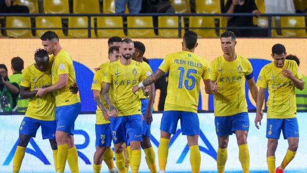 Nassr's Senegalese Forward #10 Sadio Mane celebrates after scoring his team's third goal during the Saudi Pro League football match between Al-Nassr and Al-Wehda at Al-Awwal Stadium in Riyadh on May 4, 2024. (Photo by Fayez NURELDINE / AFP)