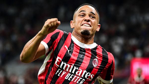 AC Milan's Swiss forward #17 Noah Okafor celebrates scoring his team's second goal during the Italian Serie A football match between AC Milan and Torino at the San Siro Stadium in Milan, on August 17, 2024. (Photo by Piero CRUCIATTI / AFP)