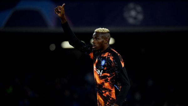 Napoli's Nigerian forward #09 Victor Osimhen warms up before the UEFA Champions League round of 16 first Leg football match between Napoli and Barcelona at the Diego-Armando-Maradona stadium in Naples on February 21, 2024. (Photo by Filippo MONTEFORTE / AFP)