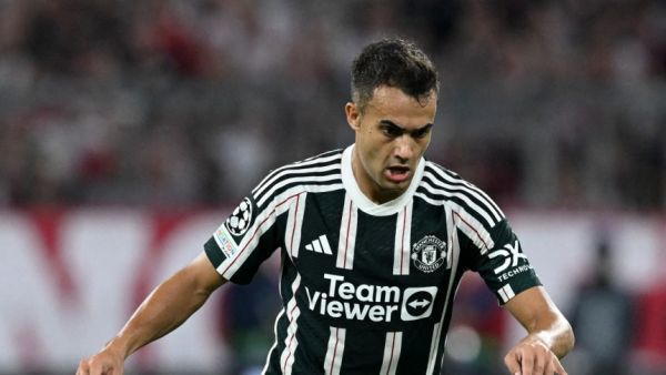 Manchester United's Spanish defender #15 Sergio Reguilon plays the ball during the UEFA Champions League Group A football match FC Bayern Munich v Manchester United in Munich, southern Germany on September 20, 2023. (Photo by Christof STACHE / AFP)