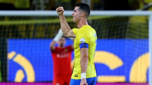 Nassr's Portuguese forward #07 Cristiano Ronaldo celebrates after scoring during the Saudi Pro League football match between Al-Ittihad and Al-Nassr at the King Saud University Stadium in Riyadh on May 27, 2024. (Photo by Fayez NURELDINE / AFP)