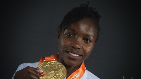 Women's 3000m steeplechase gold medallist Bahrain's Winfred Mutile Yavi poses for portraits during a studio photo session on the sidelines of the World Athletics Championships in Budapest on August 27, 2023. (Photo by ANDREJ ISAKOVIC / AFP)