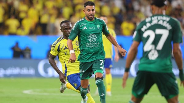 Ahli's Algerian forward #07 Riyad Mahrez runs with the ball during the Saudi Pro League football match between Al-Ahli and Al-Nassr at at al-Awwal Stadium in Riyadh on September 13, 2024. (Photo by Fayez NURELDINE / AFP)