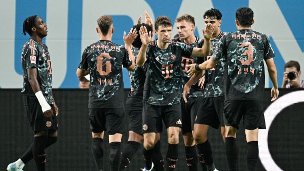 Bayern Munich’s players celebrate a goal during a friendly football match between Tottenham Hotspur and Bayern Munich at the Seoul World Cup Stadium in Seoul on August 3, 2024. (Photo by ANTHONY WALLACE / AFP)