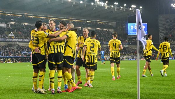 Dortmund´s players celebrate after winning the UEFA Champions League's 1st round day 1 football match between Club Brugge KV and Borussia Dortmund at the Jan Breydel Stadium in Bruges on September 18, 2024. (Photo by NICOLAS TUCAT / AFP)