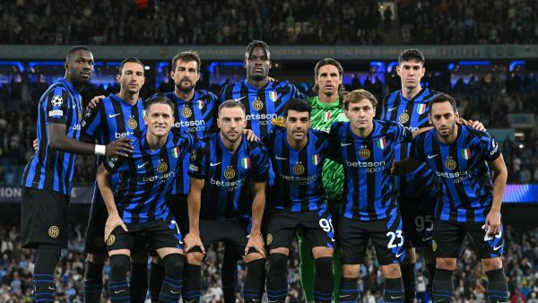 Inter Milan players pose for a team photo ahead of the UEFA Champions League, league phase football match between Manchester City and Inter Milan at the Etihad stadium, in Manchester, north-west England, on September 18, 2024 (Photo by Paul ELLIS / AFP)