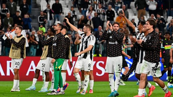 Juventus' players celebrate after winning the UEFA Champions League 1st round day 1 football match between Juventus FC and PSV Eindhoven, at the Juventus Stadium in Turin on September 17, 2024. (Photo by Isabella BONOTTO / AFP)