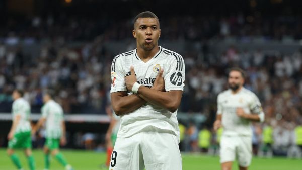 Real Madrid's French forward #09 Kylian Mbappe celebrates scoring his team's second goal from the penalty spot during the Spanish league football match between Real Real Madrid CF and Real Betis at the Santiago Bernabeu stadium in Madrid on September 1, 2024. (Photo by Thomas COEX / AFP)