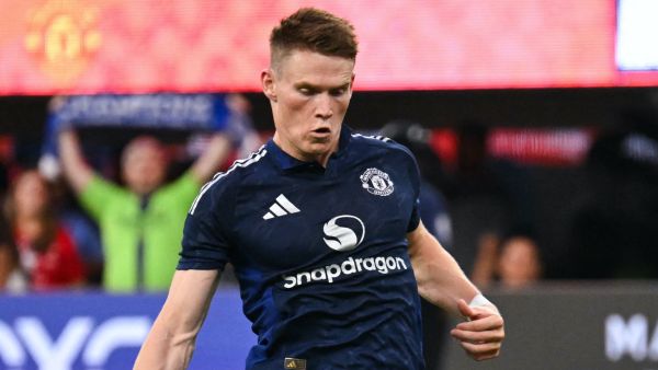 Manchester United's midfielder #39 Scott McTominay scores a penalty kick during the pre-season club friendly football match between Manchester United FC and Arsenal FC at SoFi Stadium in Inglewood, California on July 27, 2024. (Photo by Patrick T. Fallon / AFP)