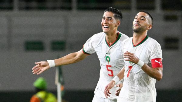 orocco's midfielder #7 Hakim Ziyech (R) celebrates with Morocco's defender #5 Nayef Aguerd after scoring his team's first goal during the Africa Cup of Nations (CAN) 2024 group F football match between Zambia and Morocco at the Stade Laurent Pokou in San Pedro on January 24, 2024. (Photo by SIA KAMBOU / AFP)