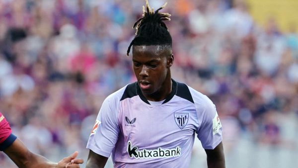 Athletic Bilbao's Spanish forward #10 Nico Williams vies for the ball during the Spanish league football match between FC Barcelona and Athletic Club Bilbao at the Estadi Olimpic Lluis Companys in Barcelona on August 24, 2024. (Photo by LLUIS GENE / AFP)