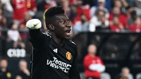 Manchester United's goalkeeper Andre Onana yells at teammates after saving the ball during a pre-season friendly football match between Manchester United FC and Borussia Dortmund at the Allegiant Stadium in Las Vegas, Nevada, on July 30, 2023. (Photo by Patrick T. Fallon / AFP)