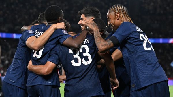 Paris Saint-Germain's players celebrate after winning the French L1 football match between Paris Saint-Germain (PSG) and Montpellier Herault SC at The Parc des Princes Stadium in Paris, on August 23, 2024. (Photo by Bertrand GUAY / AFP)