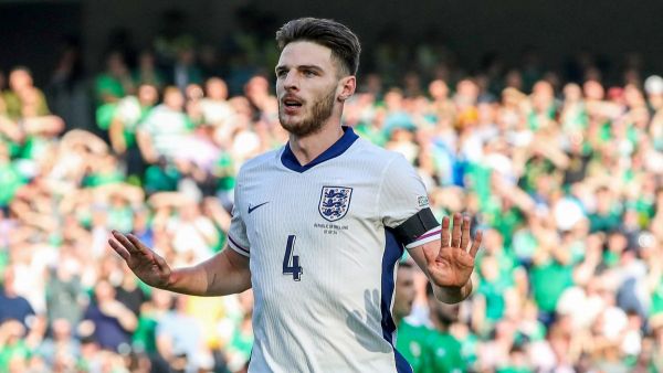 England's midfielder #04 Declan Rice reacts after scoring the team's first goal during the UEFA Nations League, League B, group 2, football match between Ireland and England at the Aviva Stadium, in Dublin, on September 7, 2024. (Photo by PAUL FAITH / AFP)