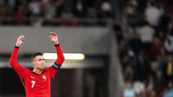 Portugal’s forward #7 Cristiano Ronaldo celebrates victory at the end of the UEFA Nations League football match, group A, between Portugal and Scotlandat Luz stadium in Lisbon on September 8, 2024. Portugal won for 2-1. (Photo by Patricia DE MELO MOREIRA / AFP)