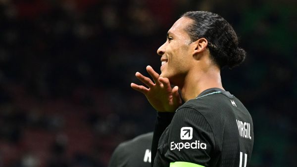 Liverpool's Dutch defender #04 Virgil van Dijk celebrates scoring his team's second goal during the UEFA Champions League 1st round day 1 football match between AC Milan and Liverpool FC at the San Siro stadium in Milan on September 17, 2024. (Photo by PIERO CRUCIATTI / AFP)