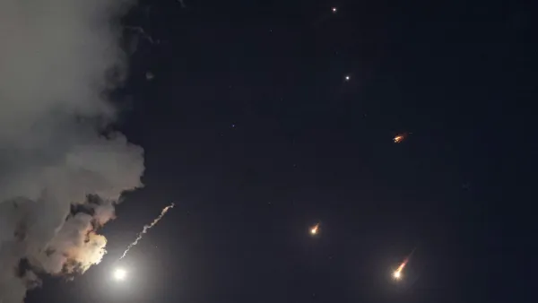 Iran launches dozens of missiles, sirens sound across Israel