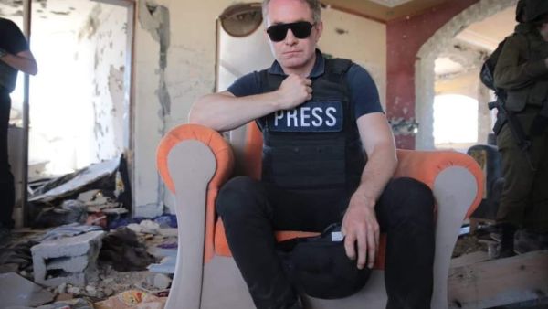 British journalist sparks controversy by sitting on Yahya Sinwar's chair