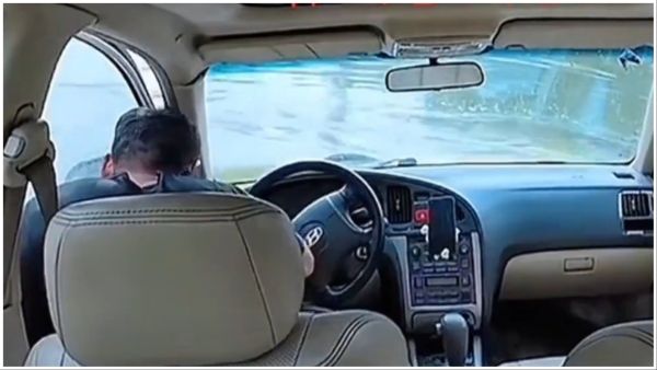 Chinese man inside his car falls into a river. (Social media) Chinese man