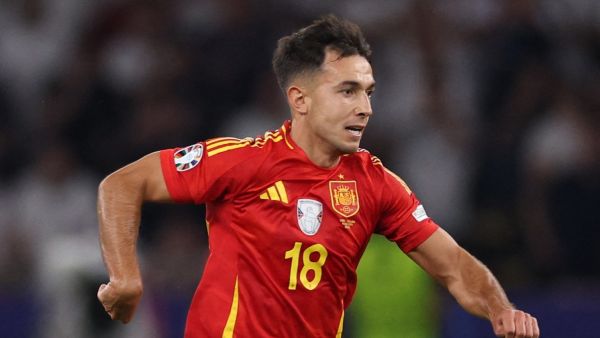 Spain's midfielder #18 Martin Zubimendi runs with the ball during the UEFA Euro 2024 final football match between Spain and England at the Olympiastadion in Berlin on July 14, 2024. (Photo by Adrian DENNIS / AFP)
