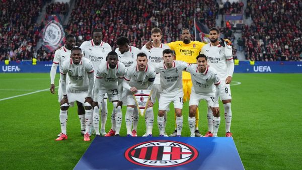 AC Milan players pose for the team photo prior to the UEFA Champions League football match between Bayer 04 Leverkusen and AC Milan in Leverkusen, western Germany on October 1, 2024. (Photo by Pau BARRENA / AFP)