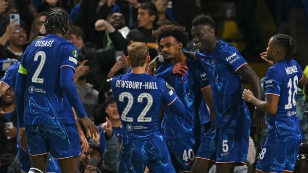 Chelsea's Portuguese midfielder #40 Renato Palma Veiga (C) celebrates with teammates after scoring the opening goal of the UEFA Conference League, league phase, football match between Chelsea and Gent at Stamford Bridge in London on October 3, 2024. (Photo by Glyn KIRK / AFP)