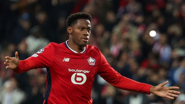 Lille's Canadian forward #09 Jonathan David celebrates scoring his team's first goal from the penalty spot during the UEFA Champions League football match between Lille LOSC and Real Madrid at the Pierre Mauroy Stadium in Villeneuve-d'Ascq, northern France, on October 2, 2024. (Photo by FRANCK FIFE / AFP)