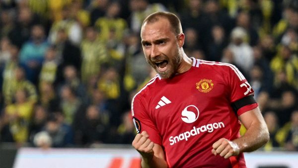 Manchester United's Danish midfielder #14 Christian Eriksen celebrates after scoring his team's first goal during the UEFA Europa League, 1st round day 3 football match between Fenerbahce SK and Manchester United at the Sukru Saracoglu Stadium in Istanbul on October 24, 2024. (Photo by Ozan KOSE / AFP)